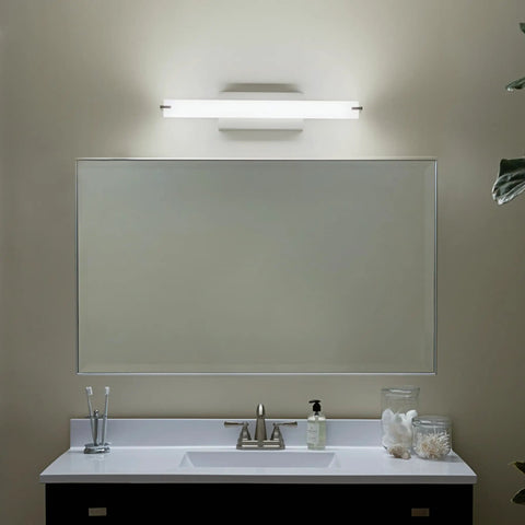 LED Linear Bathroom Vanity Light In Brushed Nickel Finish above mirror, illuminating modern bath space with sleek design.