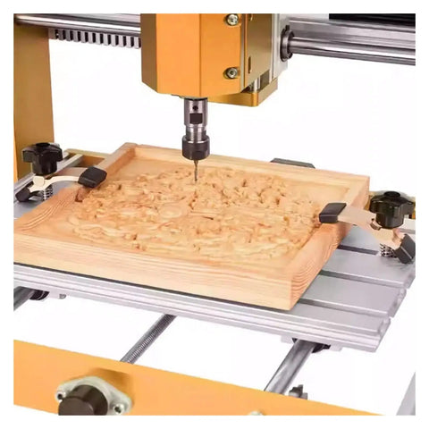 Two Piece CNC T Slot Hold Down Clamp Kit With Adjustable Pivot And Height shown securing wood on a CNC router platform