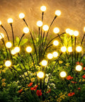 Bright Solar Outdoor Garden Spotlights Eight Head LED Landscape Lights in a garden, illuminating flowers and greenery