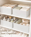 Slick 18 Piece Drawer Divider Kit Made From Tough As Nails Non Woven Fabric organizing baby clothes and toiletries in a closet.