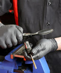 Person using Master Ratcheting Tap And Die Set With Metric And SAE Sizes For Creating And Repairing Threads Titanium Coated Finish
