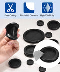 Hand holding 32 Pcs Rubber Grommets Set For 22mm Drill Holes, 18mm Inner Diameter, 28mm Outer Diameter, 0.3in Height, black