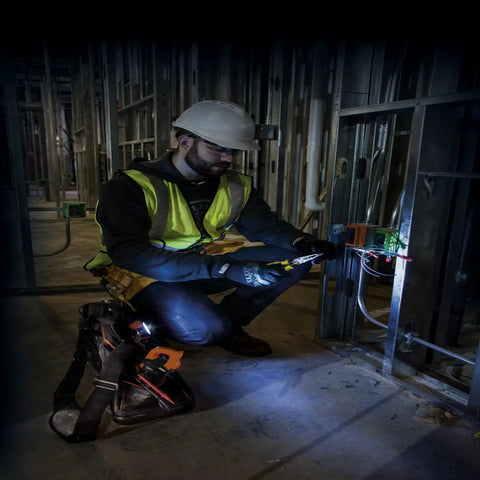 Electrician using Auto Ranging Digital Clamp Meter TRMS 600A For AC DC Voltage Current LoZ Mode Continuity Frequency NCVT Temperature