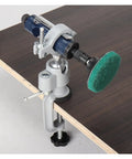 No Hassle 360 Degree Swivel Tool Holder Bracket And Table Vise Stand Built From Iron Tough Aluminum Alloy securing a drill on a workbench.