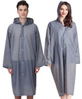 Two adults wearing Ultra Lightweight Reusable Rain Ponchos For Adults 2 Pack With Hood Unisex Waterproof Rain Gear for outdoors