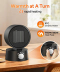 Compact 600W Desk Heater With Ceramic Core, Fast Heat For Office Or Bedroom on wooden desk with control knob close-up