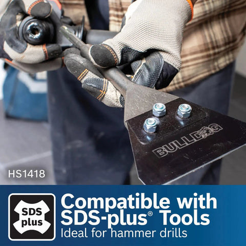 Close-up of 5 In. By 11 In. SDS-Plus Bulldog Floor Scraper With Durable Steel Blade and Locking Bolt Attachment in use.