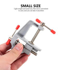 Person holding Dope Mini Aluminum Bench Vise Clamp For Jewelry Crafting Woodworking And Hobby Projects Portable Table Repair Tool Compact Workholding Device For Edges Of Desk