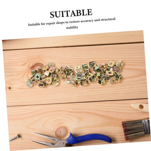 50Pcs Gold Iron Captive Nut U-Clip Fasteners for Car Bumper Grill and License Plate Mounting on wooden background.