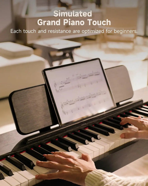 Playing the OURA S100 88 Key Graded Hammer Action Digital Piano With Bluetooth, in a modern living room setting.