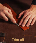 Using Six Piece Leather Edge Tool Kit with four graded edge bevelers, skiving knife shown trimming leather strip for crafts.