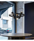 Industrial Style Living Room Pendant Lights Modern Simple Restaurant Lighting Fixtures Creative LED Hanging Lamps with black metal design.