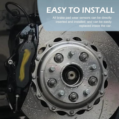 Brake rotor and wheel hub assembly with a black caliper in the background; silver rotor, multiple studs.