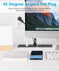 Flat Plug Recessed Power Strip With 5 AC Outlets And 6 USB Ports beneath desk, charging devices, angled plug in use.