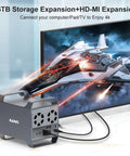 Heavy Duty Four Bay Hard Drive Enclosure With Usb C And Ten Gbps Speed For 3.5 Inch Sata Drives Packed With Dual Active Cooling Fans And Slick Desktop Das Storage Hub Setup connected to a TV with visible cables.
