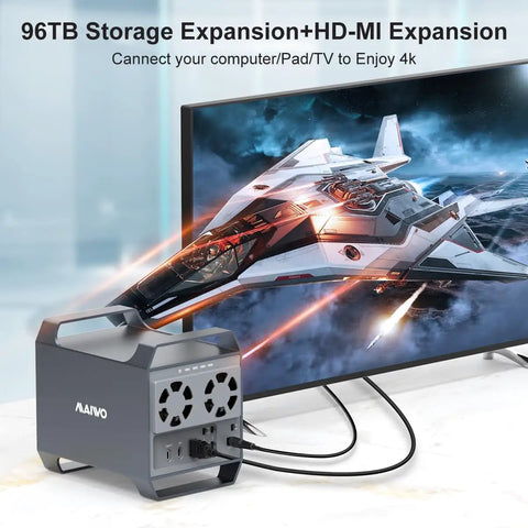 Heavy Duty Four Bay Hard Drive Enclosure With Usb C And Ten Gbps Speed For 3.5 Inch Sata Drives Packed With Dual Active Cooling Fans And Slick Desktop Das Storage Hub Setup connected to a TV with visible cables.