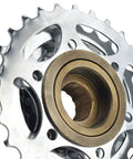 Close-up of Five To Eleven Speed Bicycle Freewheel Kit with 14-28T high tensile steel cogs showing smooth precision threads.