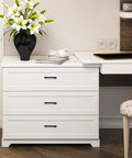 White dresser with 3 inch wide foot cabinet pulls 10 pack matte black cabinet handles, placed in a modern room with flowers on top.