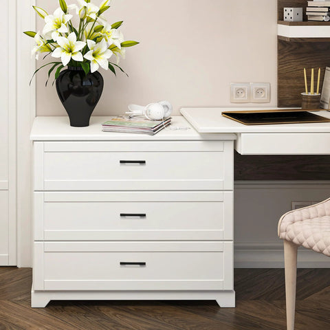 White dresser with 3 inch wide foot cabinet pulls 10 pack matte black cabinet handles, placed in a modern room with flowers on top.