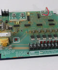 Top Shelf Industrial Dust Collector Control PCB Circuit Board For Shop Gear Built Tough Tested Runs Like A Champ Heavy Duty Module, green rectangular board with components.