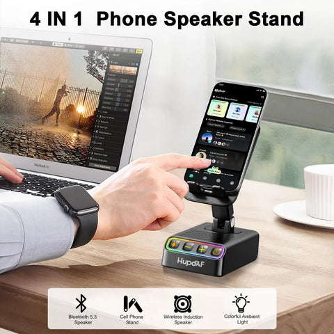 Person using Go To All In One Adjustable Phone Stand With Wireless Induction Bluetooth Speaker HD Surround Sound And RGB Rhythm Lights on desk