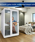 Rock Solid Soundproof Office Pod Featuring Tight Acoustic Sealing For Mobile Focus Booth with musician inside and sleeper outside.