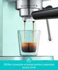 Compact Stainless Steel Espresso Machine With Powerful Steam Wand For Killer Lattes And Smooth Shots At Home brewing espresso shot.
