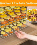 Heavy Hitter Commercial Food Dehydrator With 16 Stainless Steel Trays And 1500 Watts showing drying fruits and vegetables on trays.