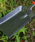 Lightweight Fireplace Shovel 12.6 Inch Ash Shovel for fire pit with carbon steel head and rubber handle in outdoor setting.
