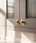 Solid Brass Gold Cabinet Knobs 4 Pack With Swallow Backplates on kitchen cabinet, brushed brass finish, modern dresser handles