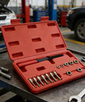 Ultimate 15 Piece Thread Repair Kit With Taps And Dies Plus Double Ended File To Fix Stripped Bolts On Steel And Aluminum Without Breaking The Bank At Home Or In The Shop. Red case open with metric taps and dies on a workbench.