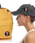 Woman wearing hat with Dope Tinplate Button Pins With Plastic Backs For Clothing And Bags Small Round Badges beside backpack