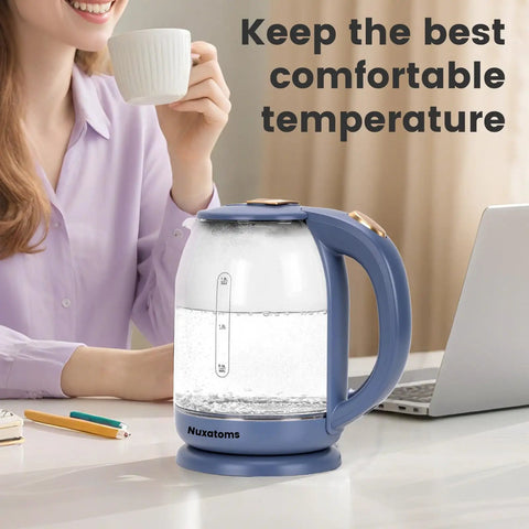 Glass Electric Kettle With No Plastic Contact With Water 1.8L Borosilicate Glass Teapot on desk near laptop