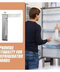Durable Tough Refrigerator Freezer Door Hinge Replacement 1 Piece Silver With Low Friction Quiet Operation Screws Included Easy Install For Residential Use Fits Most Doors next to an open fridge with two people discussing.
