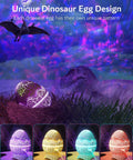 Dinosaur Eggs Galaxy Star Projector With Bluetooth Nebula LED Night Light, projecting colorful patterns in night sky theme.