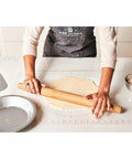 Person using Non Slip Silicone Rolling Mat For Dough Kneading And Rolling Nonstick Surface For Measuring And Baking.