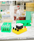Hands On Optical Demonstrator Set For Primary Colors And Light Experiments In Classroom And Lab on a lab table with components