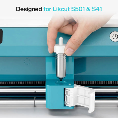 Close-up of hand inserting Two Pack Scoring Stylus Pens For S501 And S41 Vinyl Cutters into machine for crafting.