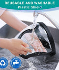 Washing Total Face Shield for Adults, Men, and Women 2 Pack under running water in a sink, demonstrating reusability and durability.