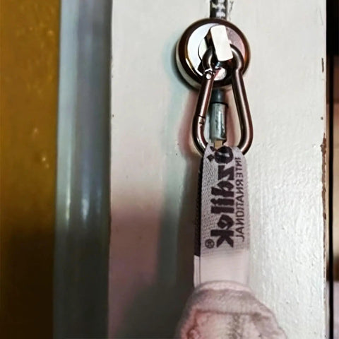 Heavy Duty Magnetic Carabiner Hooks Featuring Badass Strength Neodymium Magnets And A Smooth Swivel Hook for hanging items indoors.