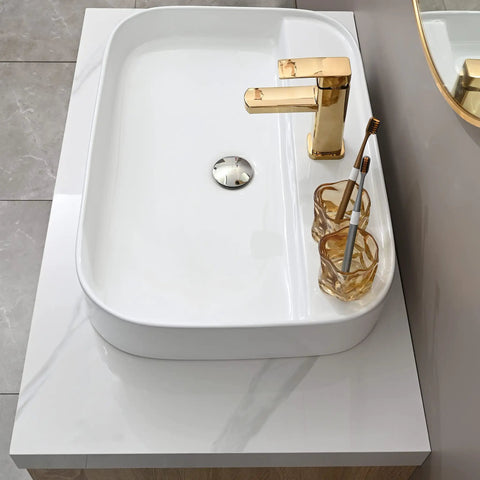 Dope 25.6 Inch Rectangle Vessel Sink With Pop Up Drain For Above Counter Installation in white porcelain with gold faucet