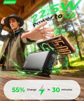 Ultra 50000mAh Portable Charger With PD 22.5W Fast Charging And Hella Solid Power Bank in outdoor setting, charging smartphone.