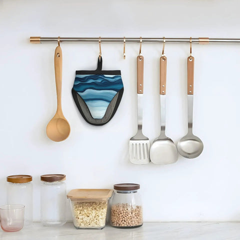 Hot Kitchen Gear Mini Oven Mitts With Non Slip Silicone Grip And Heat Resistant Cotton Padding For Safely Handling Pans Pots And Baking Trays Up To 500 Degrees F hanging with kitchen utensils.