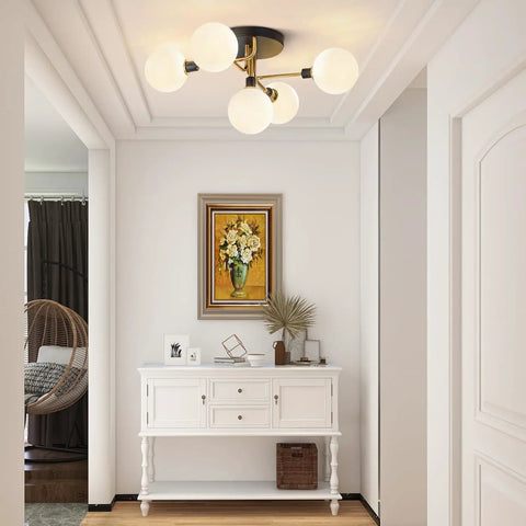 Five Light Mid Century Modern Milk Glass Globe Ceiling Light In Black And Brass Semi Flush Mount Sputnik Fixture in hallway