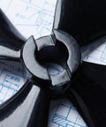 RC Boat Propeller Set 50mm 4 Blade CW CCW For 4mm Shafts PC Plastic Replacement Props close-up on blueprint background