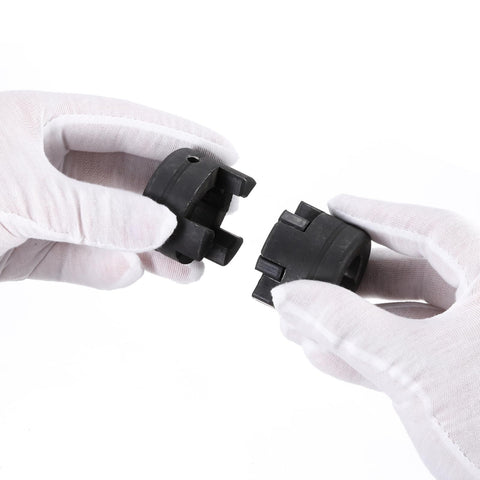 Hands holding Heavy Duty Flexible L-Jaw Coupling Set 1/2 to 1 Inch Bore 3-Piece with Buna-N NBR Rubber Spider and HT250 Steel