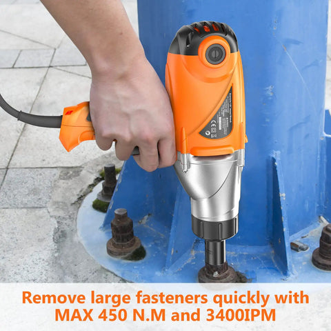 Person using 8.5 Amp Electric Impact Wrench One Half Inch Drive 450 Nm Max Torque Corded Power Tool With Four Sockets Hog Ring Anvil All Metal Gear High RPM For Stubborn Fasteners