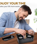Man using the Odor Proof Stash Box With Grinder Tray, Waterproof Travel Storage Case For Men And Women at a wooden table