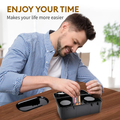 Man using the Odor Proof Stash Box With Grinder Tray, Waterproof Travel Storage Case For Men And Women at a wooden table