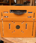 Rugged As Nails Circular Saw Base Plate Swap Out Bottom Board shows orange design with saw blade, measuring scales for precision cuts.